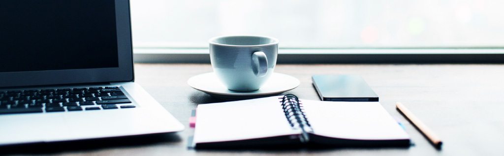 A group of professionals watching a presentation.